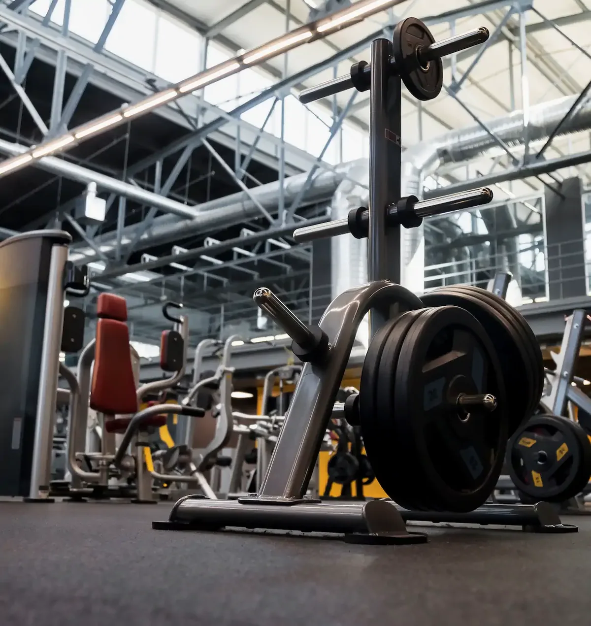 Weight room with racks and plates